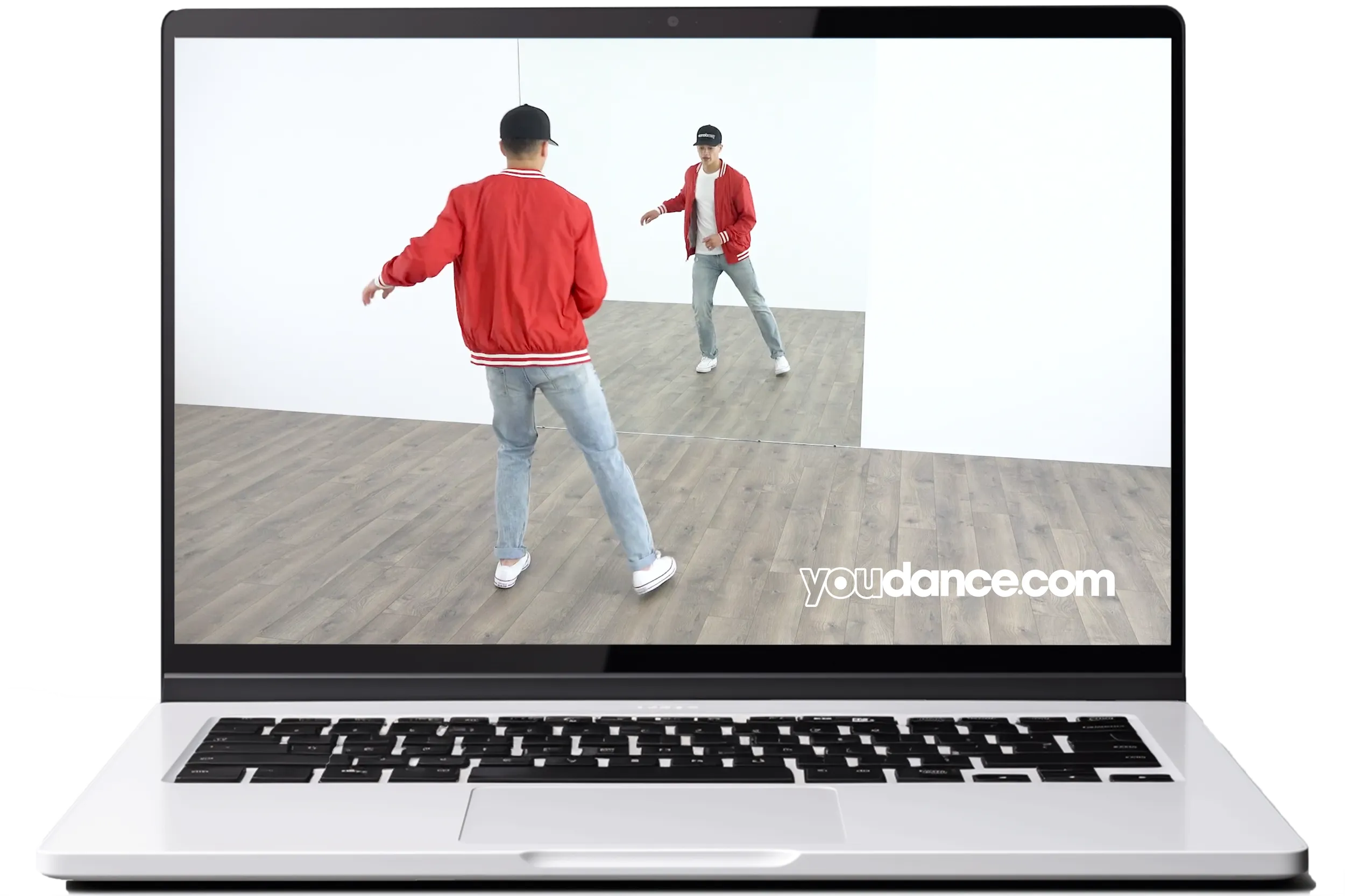 A YouDance lesson playing on a laptop at home